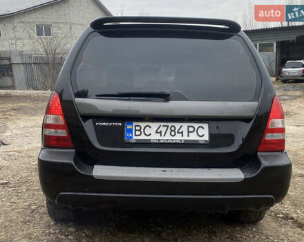 Черный Субару Форестер, объемом двигателя 1.99 л и пробегом 300 тыс. км за 3200 $, фото 5 на Automoto.ua