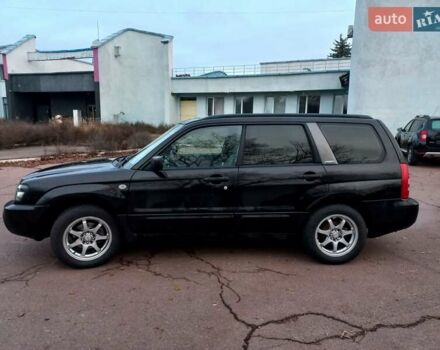 Черный Субару Форестер, объемом двигателя 1.99 л и пробегом 295 тыс. км за 5500 $, фото 5 на Automoto.ua