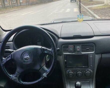 Черный Субару Форестер, объемом двигателя 2 л и пробегом 285 тыс. км за 5500 $, фото 2 на Automoto.ua