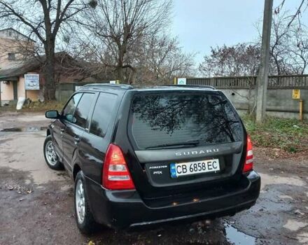 Черный Субару Форестер, объемом двигателя 1.99 л и пробегом 295 тыс. км за 5500 $, фото 2 на Automoto.ua