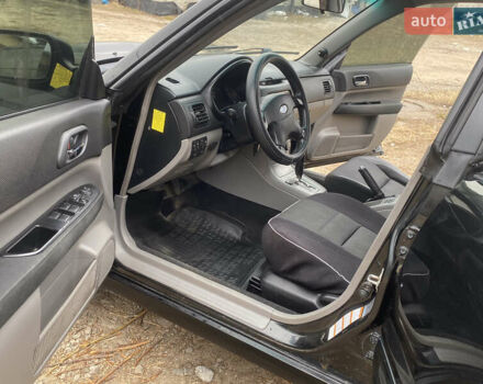 Черный Субару Форестер, объемом двигателя 1.99 л и пробегом 300 тыс. км за 3200 $, фото 10 на Automoto.ua