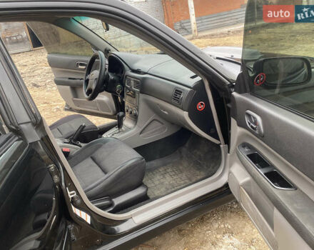 Черный Субару Форестер, объемом двигателя 1.99 л и пробегом 300 тыс. км за 3200 $, фото 7 на Automoto.ua