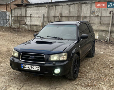 Черный Субару Форестер, объемом двигателя 1.99 л и пробегом 300 тыс. км за 3200 $, фото 1 на Automoto.ua