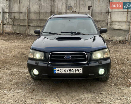 Черный Субару Форестер, объемом двигателя 1.99 л и пробегом 300 тыс. км за 3200 $, фото 2 на Automoto.ua