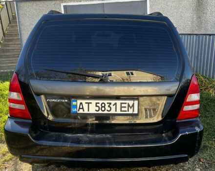 Черный Субару Форестер, объемом двигателя 1.99 л и пробегом 350 тыс. км за 4999 $, фото 6 на Automoto.ua