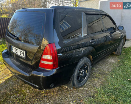 Черный Субару Форестер, объемом двигателя 1.99 л и пробегом 350 тыс. км за 4999 $, фото 5 на Automoto.ua