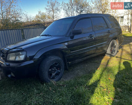 Черный Субару Форестер, объемом двигателя 1.99 л и пробегом 350 тыс. км за 4999 $, фото 2 на Automoto.ua