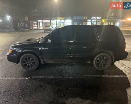 Черный Субару Форестер, объемом двигателя 2 л и пробегом 296 тыс. км за 5600 $, фото 2 на Automoto.ua