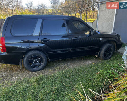 Черный Субару Форестер, объемом двигателя 1.99 л и пробегом 350 тыс. км за 4999 $, фото 4 на Automoto.ua