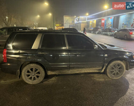 Черный Субару Форестер, объемом двигателя 2 л и пробегом 296 тыс. км за 5600 $, фото 4 на Automoto.ua