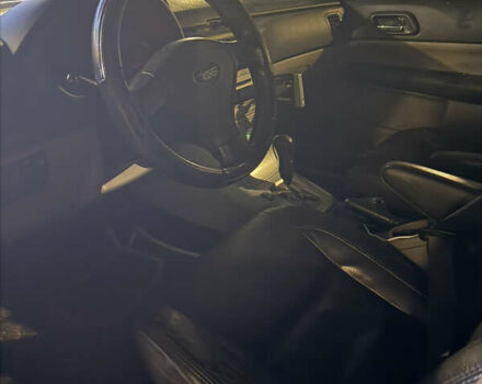 Черный Субару Форестер, объемом двигателя 2 л и пробегом 296 тыс. км за 5600 $, фото 5 на Automoto.ua