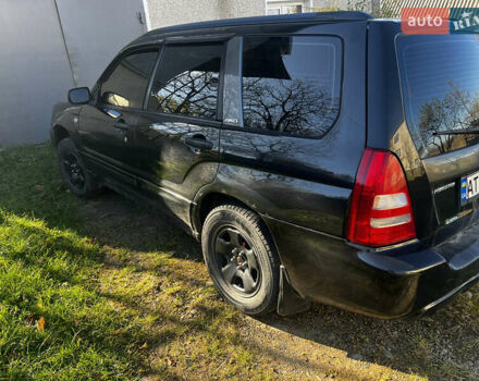 Черный Субару Форестер, объемом двигателя 1.99 л и пробегом 350 тыс. км за 4999 $, фото 3 на Automoto.ua