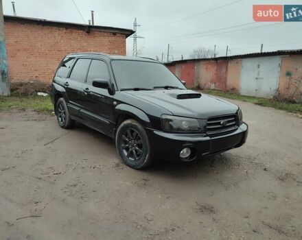 Черный Субару Форестер, объемом двигателя 1.99 л и пробегом 440 тыс. км за 5200 $, фото 3 на Automoto.ua