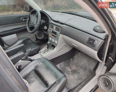 Черный Субару Форестер, объемом двигателя 1.99 л и пробегом 440 тыс. км за 5200 $, фото 9 на Automoto.ua