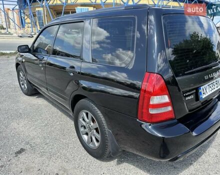 Черный Субару Форестер, объемом двигателя 1.99 л и пробегом 208 тыс. км за 5999 $, фото 18 на Automoto.ua