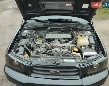 Черный Субару Форестер, объемом двигателя 1.99 л и пробегом 440 тыс. км за 5200 $, фото 11 на Automoto.ua