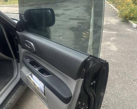 Чорний Субару Forester, об'ємом двигуна 2 л та пробігом 260 тис. км за 5800 $, фото 5 на Automoto.ua