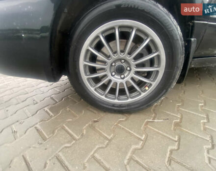 Чорний Субару Forester, об'ємом двигуна 2 л та пробігом 260 тис. км за 6999 $, фото 4 на Automoto.ua