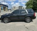 Чорний Субару Forester, об'ємом двигуна 2 л та пробігом 208 тис. км за 5999 $, фото 2 на Automoto.ua