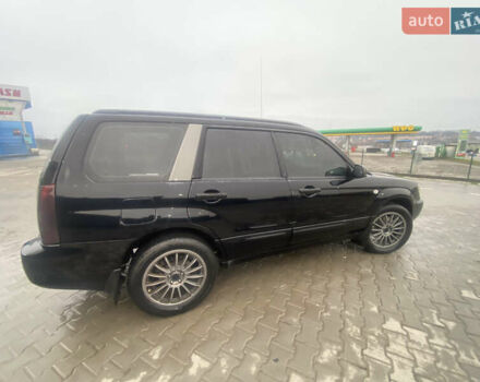 Чорний Субару Forester, об'ємом двигуна 2 л та пробігом 260 тис. км за 6999 $, фото 2 на Automoto.ua