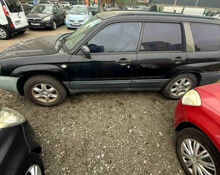 Черный Субару Форестер, объемом двигателя 2 л и пробегом 57 тыс. км за 5500 $, фото 5 на Automoto.ua