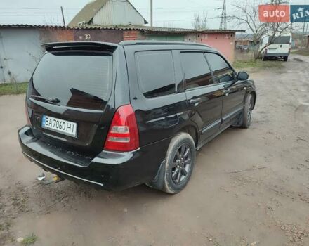 Черный Субару Форестер, объемом двигателя 1.99 л и пробегом 440 тыс. км за 5200 $, фото 7 на Automoto.ua