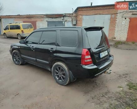 Черный Субару Форестер, объемом двигателя 1.99 л и пробегом 440 тыс. км за 5200 $, фото 6 на Automoto.ua