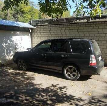 Черный Субару Форестер, объемом двигателя 2.46 л и пробегом 318 тыс. км за 6999 $, фото 5 на Automoto.ua