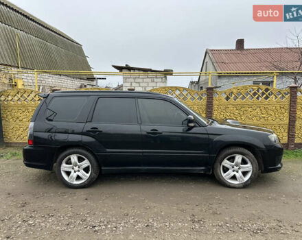 Черный Субару Форестер, объемом двигателя 2.5 л и пробегом 290 тыс. км за 9000 $, фото 1 на Automoto.ua