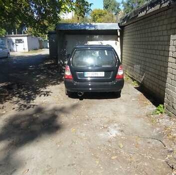 Черный Субару Форестер, объемом двигателя 2.46 л и пробегом 318 тыс. км за 6999 $, фото 6 на Automoto.ua