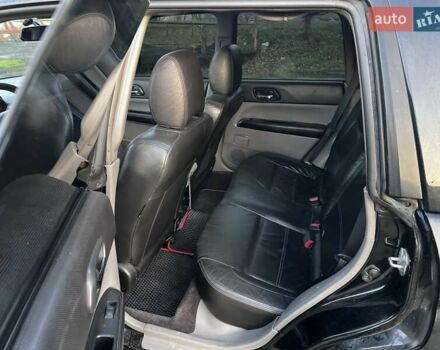 Черный Субару Форестер, объемом двигателя 2.5 л и пробегом 235 тыс. км за 5650 $, фото 3 на Automoto.ua