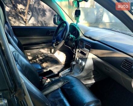 Субару Forester 2007 у Чернівцях на Automoto.ua Чорний Субару Forester, об'ємом двигуна 2 л та пробігом 180 тис. км за 5300 $, фото 3 на Automoto.ua