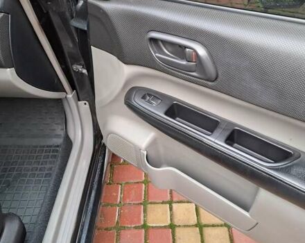 Черный Субару Форестер, объемом двигателя 1.99 л и пробегом 225 тыс. км за 8000 $, фото 19 на Automoto.ua