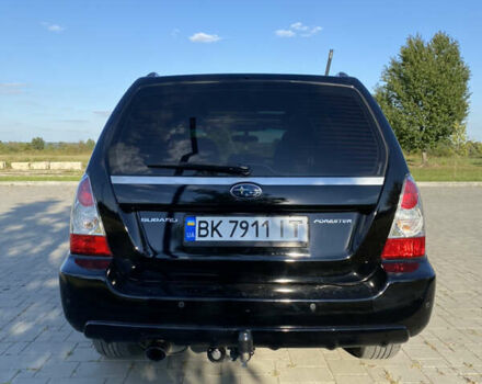 Черный Субару Форестер, объемом двигателя 1.99 л и пробегом 345 тыс. км за 6700 $, фото 5 на Automoto.ua