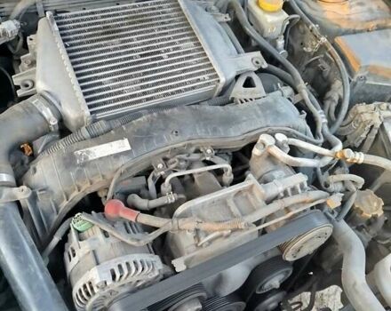 Черный Субару Форестер, объемом двигателя 2 л и пробегом 250 тыс. км за 11000 $, фото 3 на Automoto.ua