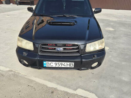 Черный Субару Форестер, объемом двигателя 2 л и пробегом 230 тыс. км за 6000 $, фото 1 на Automoto.ua