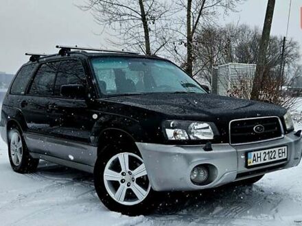 Черный Субару Форестер, объемом двигателя 1.99 л и пробегом 330 тыс. км за 4999 $, фото 1 на Automoto.ua