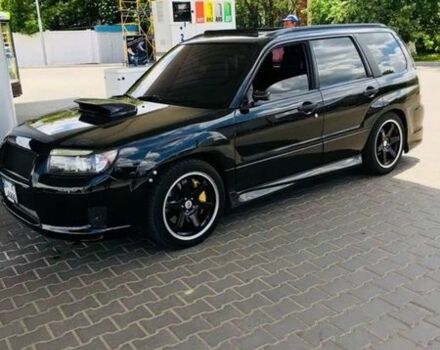 Черный Субару Форестер, объемом двигателя 2.5 л и пробегом 96 тыс. км за 12000 $, фото 1 на Automoto.ua