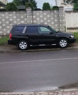 Черный Субару Форестер, объемом двигателя 2 л и пробегом 330 тыс. км за 4000 $, фото 1 на Automoto.ua