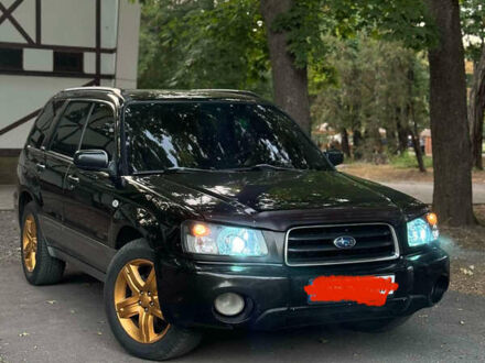 Чорний Субару Forester, об'ємом двигуна 2 л та пробігом 345 тис. км за 4800 $, фото 1 на Automoto.ua