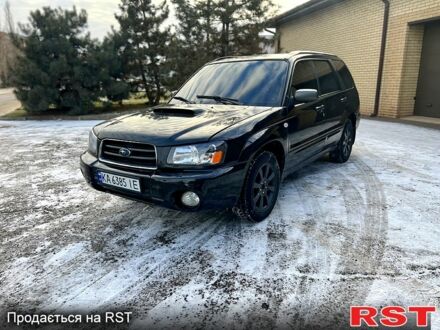 Черный Субару Форестер, объемом двигателя 2 л и пробегом 295 тыс. км за 4250 $, фото 1 на Automoto.ua