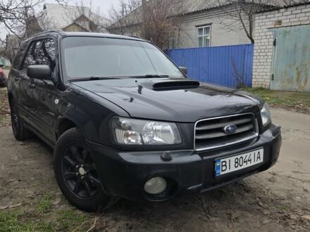 Черный Субару Форестер, объемом двигателя 2 л и пробегом 300 тыс. км за 5000 $, фото 1 на Automoto.ua