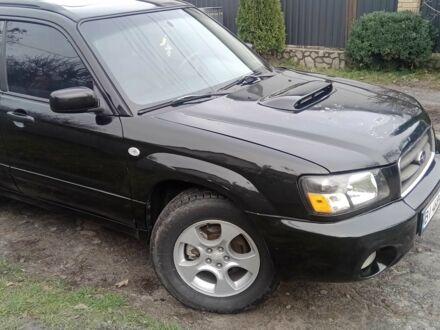 Черный Субару Форестер, объемом двигателя 2 л и пробегом 210 тыс. км за 4200 $, фото 1 на Automoto.ua