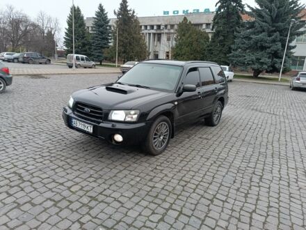 Черный Субару Форестер, объемом двигателя 2 л и пробегом 230 тыс. км за 6500 $, фото 1 на Automoto.ua