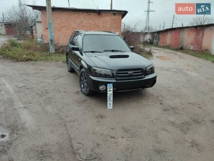 Черный Субару Форестер, объемом двигателя 1.99 л и пробегом 440 тыс. км за 5200 $, фото 1 на Automoto.ua