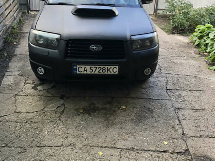 Черный Субару Форестер, объемом двигателя 2.5 л и пробегом 280 тыс. км за 9000 $, фото 1 на Automoto.ua