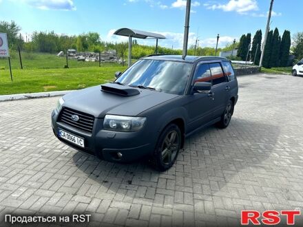 Чорний Субару Forester, об'ємом двигуна 2.5 л та пробігом 255 тис. км за 10000 $, фото 1 на Automoto.ua