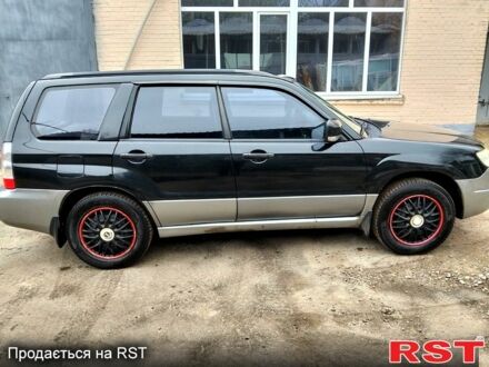 Черный Субару Форестер, объемом двигателя 2 л и пробегом 27600 тыс. км за 6300 $, фото 1 на Automoto.ua