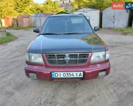 Красный Субару Форестер, объемом двигателя 2 л и пробегом 230 тыс. км за 3500 $, фото 1 на Automoto.ua