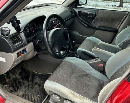 Красный Субару Форестер, объемом двигателя 2 л и пробегом 341 тыс. км за 3200 $, фото 1 на Automoto.ua